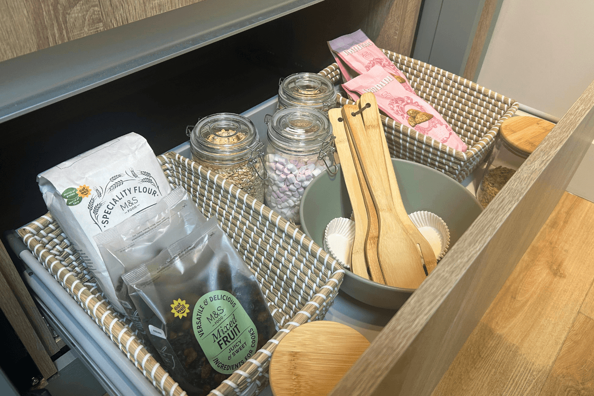 Kitchen with deep drawer that holds ingredients for baking